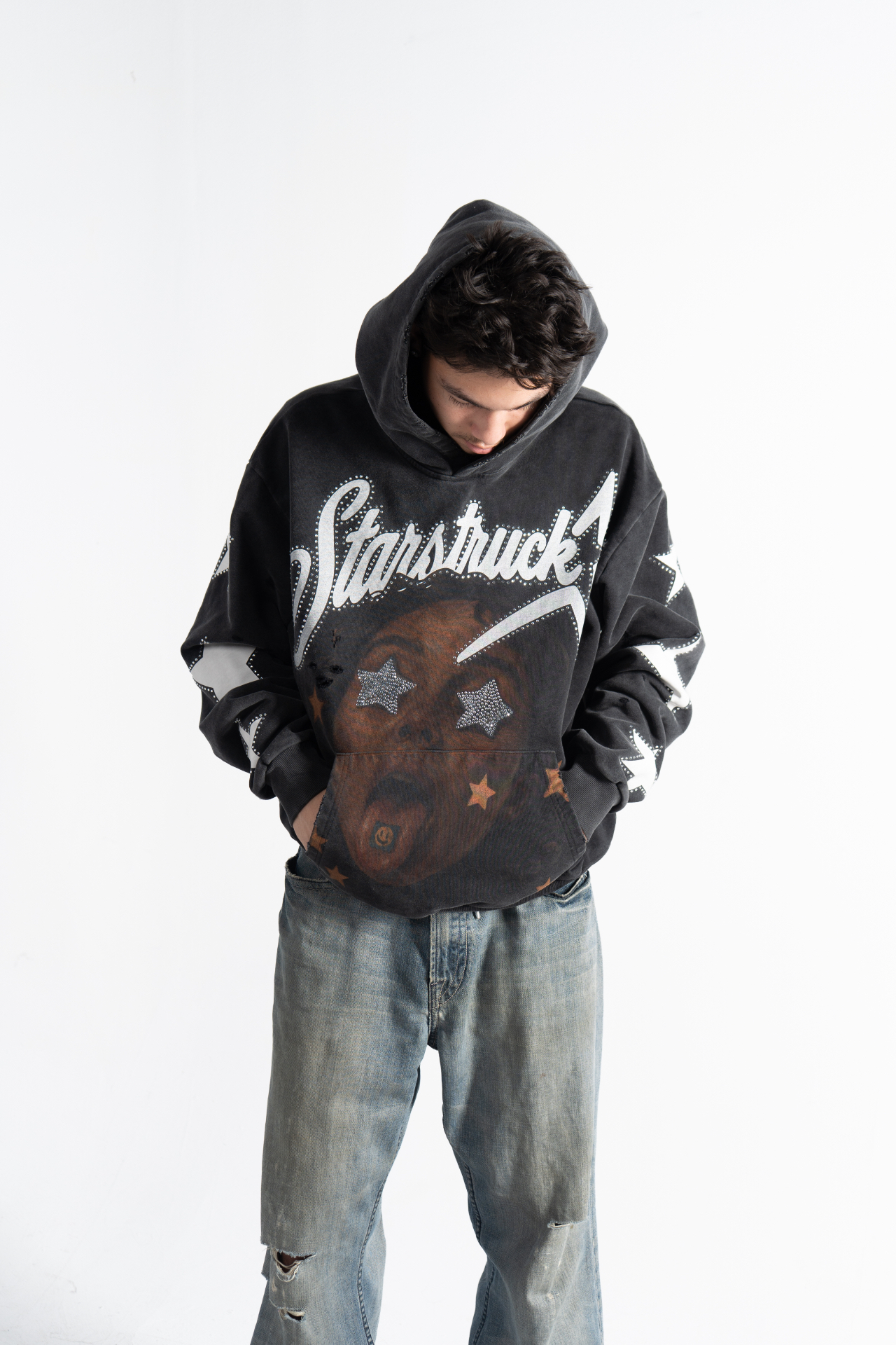 Male model in the black Starstruck Hoodie, front view